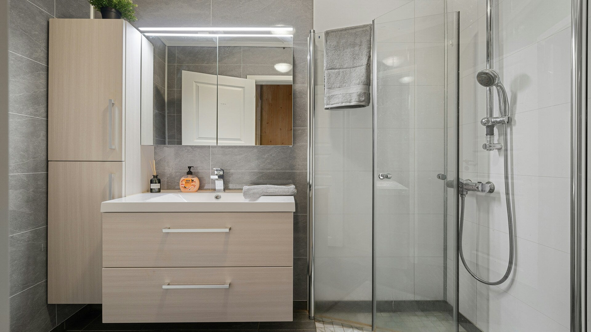 vanity unit, bathroom vanity mirror, shower enclosure and shower set